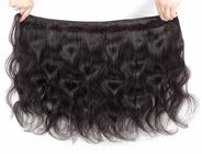 O cabelo 100% longo ondulado brasileiro do Virgin empacota três partes 4 x o fechamento 4